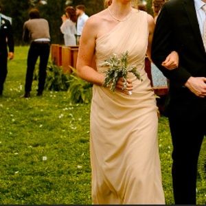 Like new, only worn once, one shoulder champagne dress. Size 8.